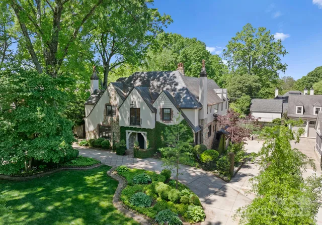 a house with trees in the background