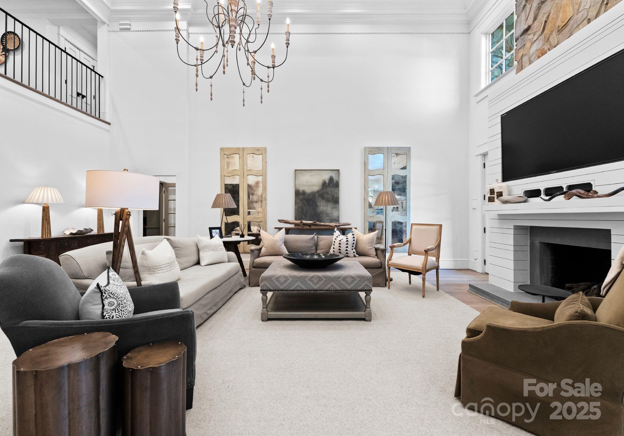 1550 Queens Road West Charlotte, NC 28207 - Photo 16 of 40 a living room with furniture and a flat screen tv