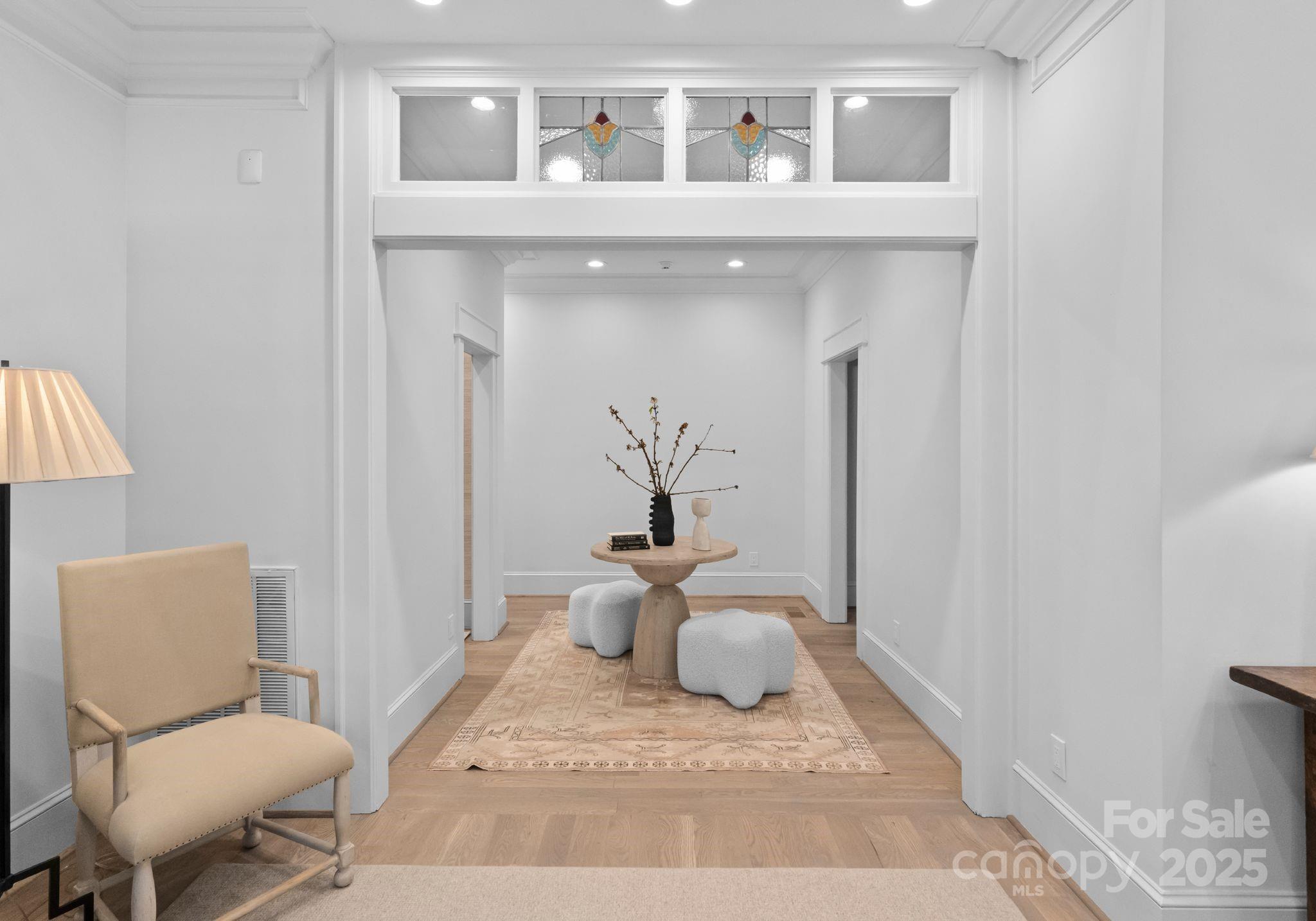 1550 Queens Road West Charlotte, NC 28207 - Photo 17 of 40 a living room with furniture and a lamp