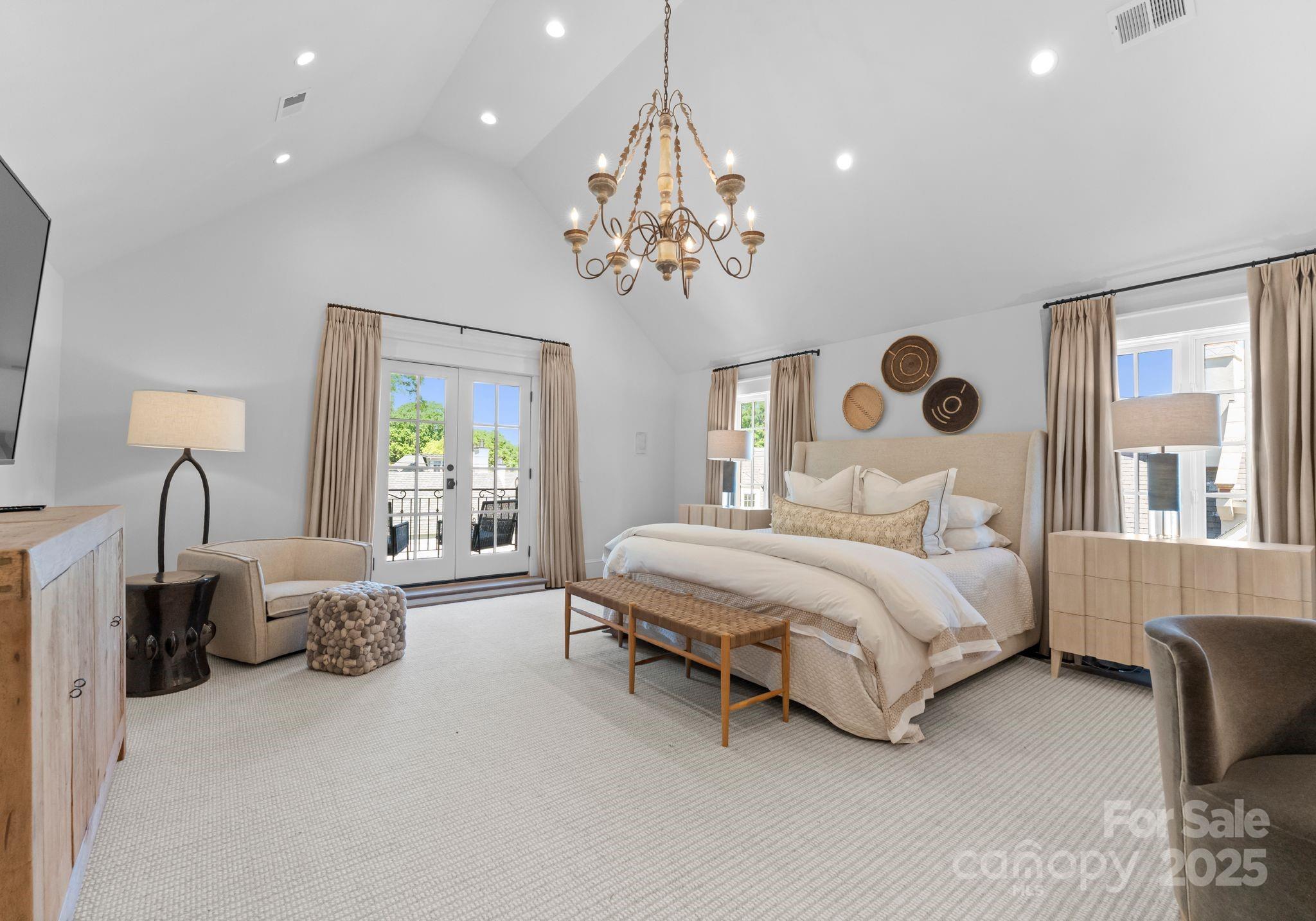 1550 Queens Road West Charlotte, NC 28207 - Photo 21 of 40 a bedroom with a bed couch and window