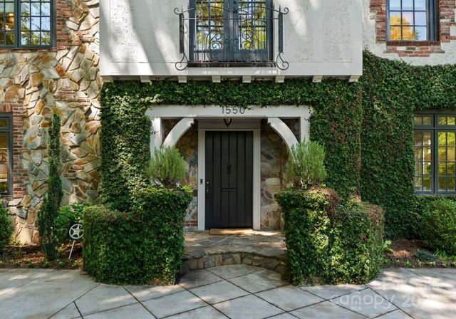 a front view of a house with yard