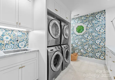 a bedroom with a bed and a lamp on table