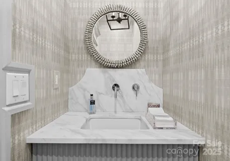 a view of a livingroom with workspace and a window