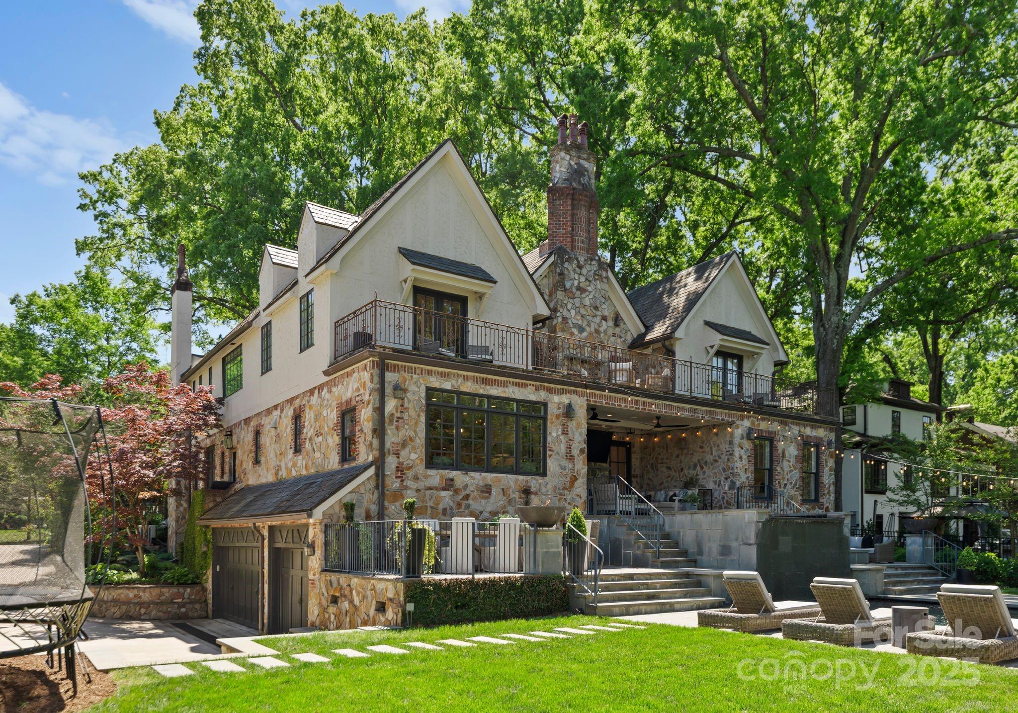 1550 Queens Road West Charlotte, NC 28207 - Photo 37 of 40 a front view of a house with garden