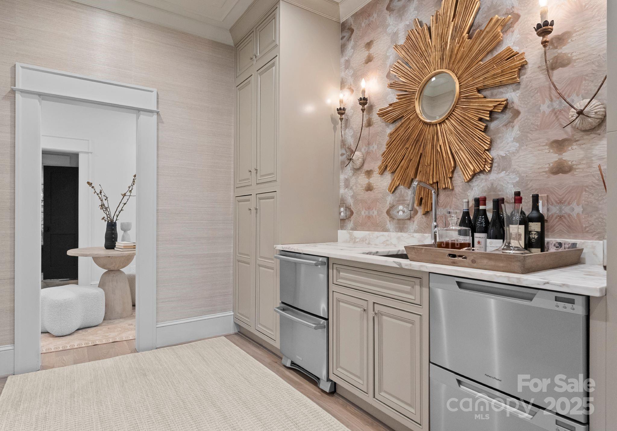 1550 Queens Road West Charlotte, NC 28207 - Photo 10 of 40 a kitchen with a sink and a stove with white countertops