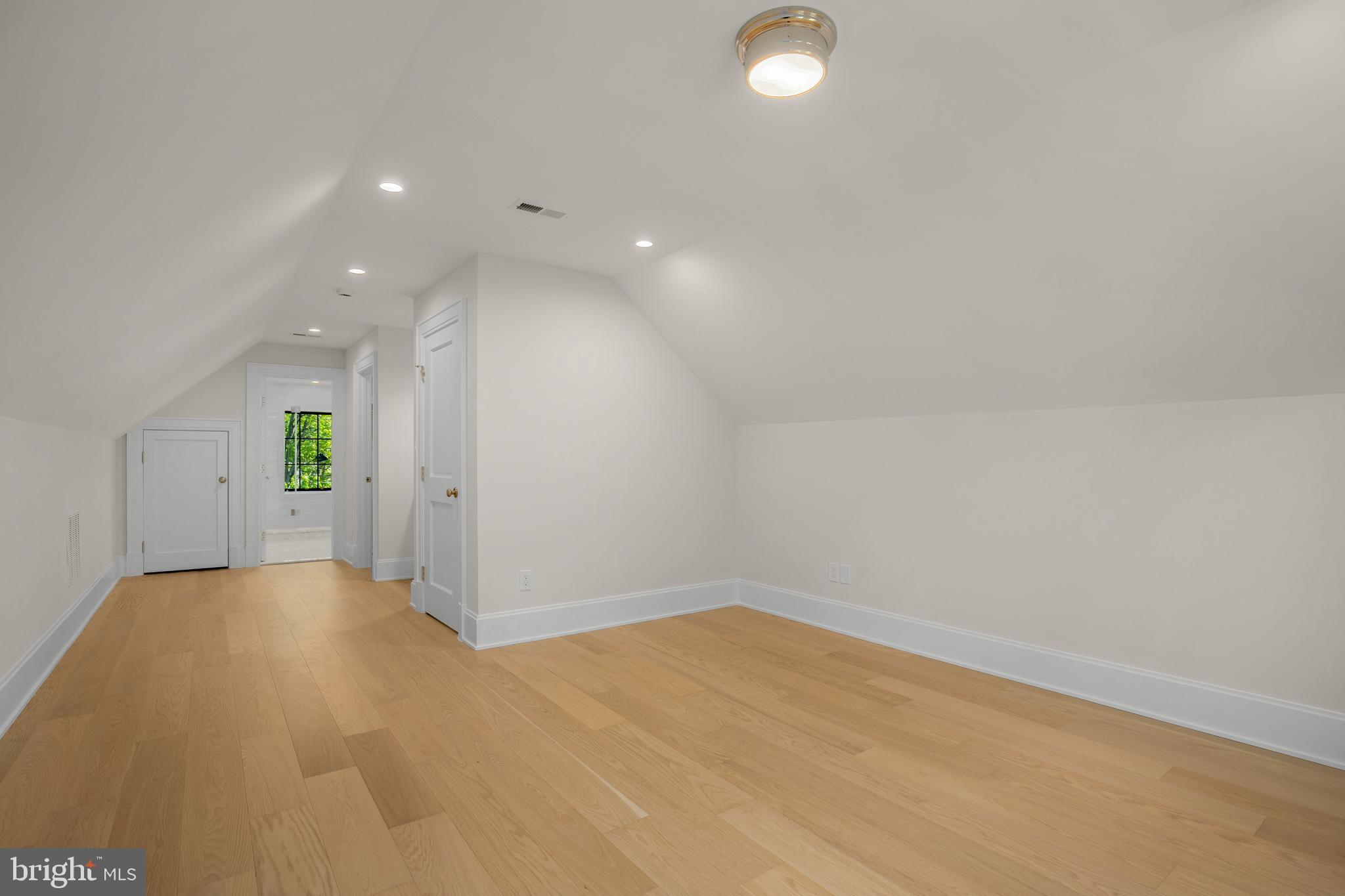 2710 36th Street Northwest Washington, DC 20007 - Photo 25 of 29 a view of a big room with wooden floor and windows