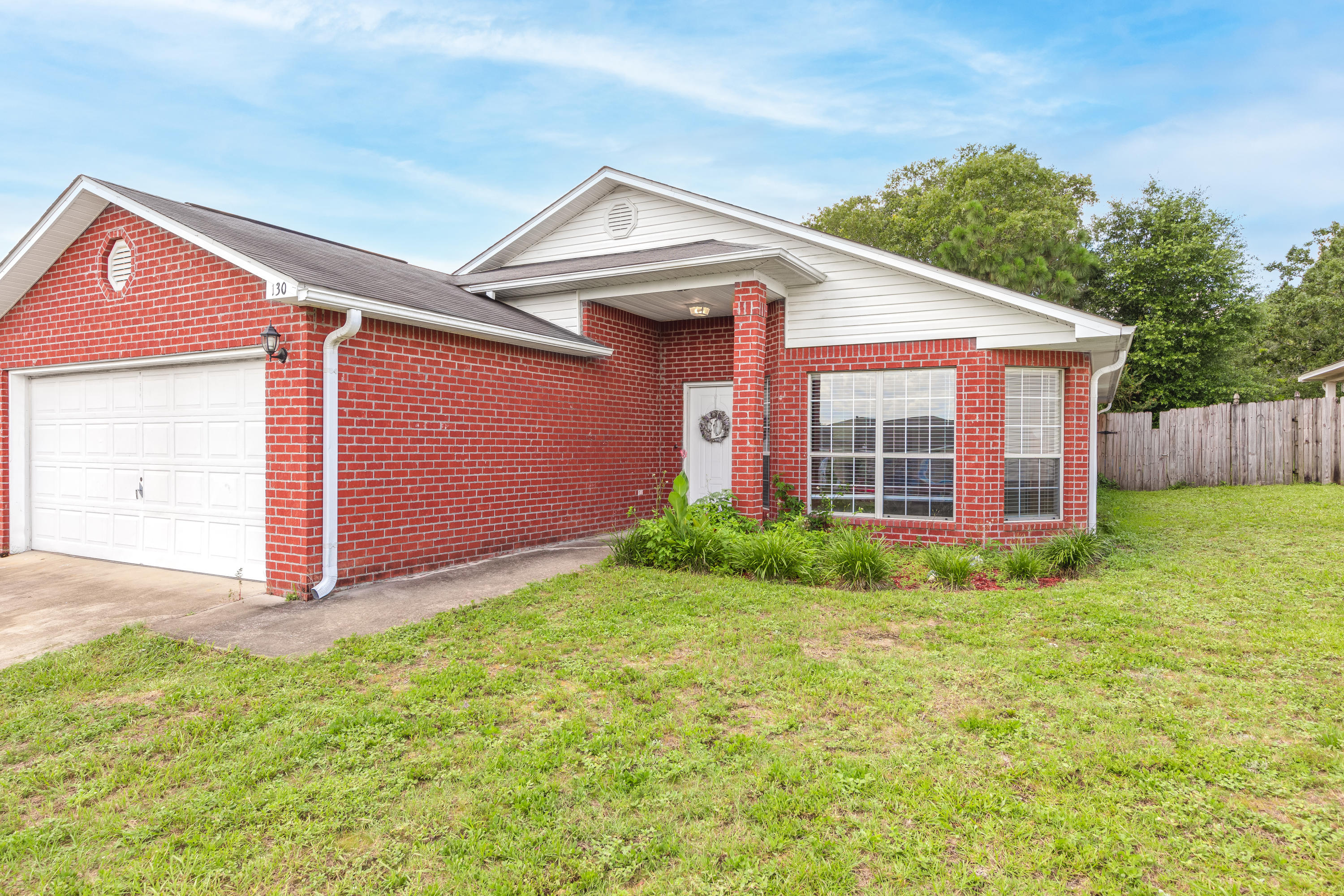130 Sandstone Trail Crestview, FL 32539 - Photo 1 of 24 a view of a house with backyard
