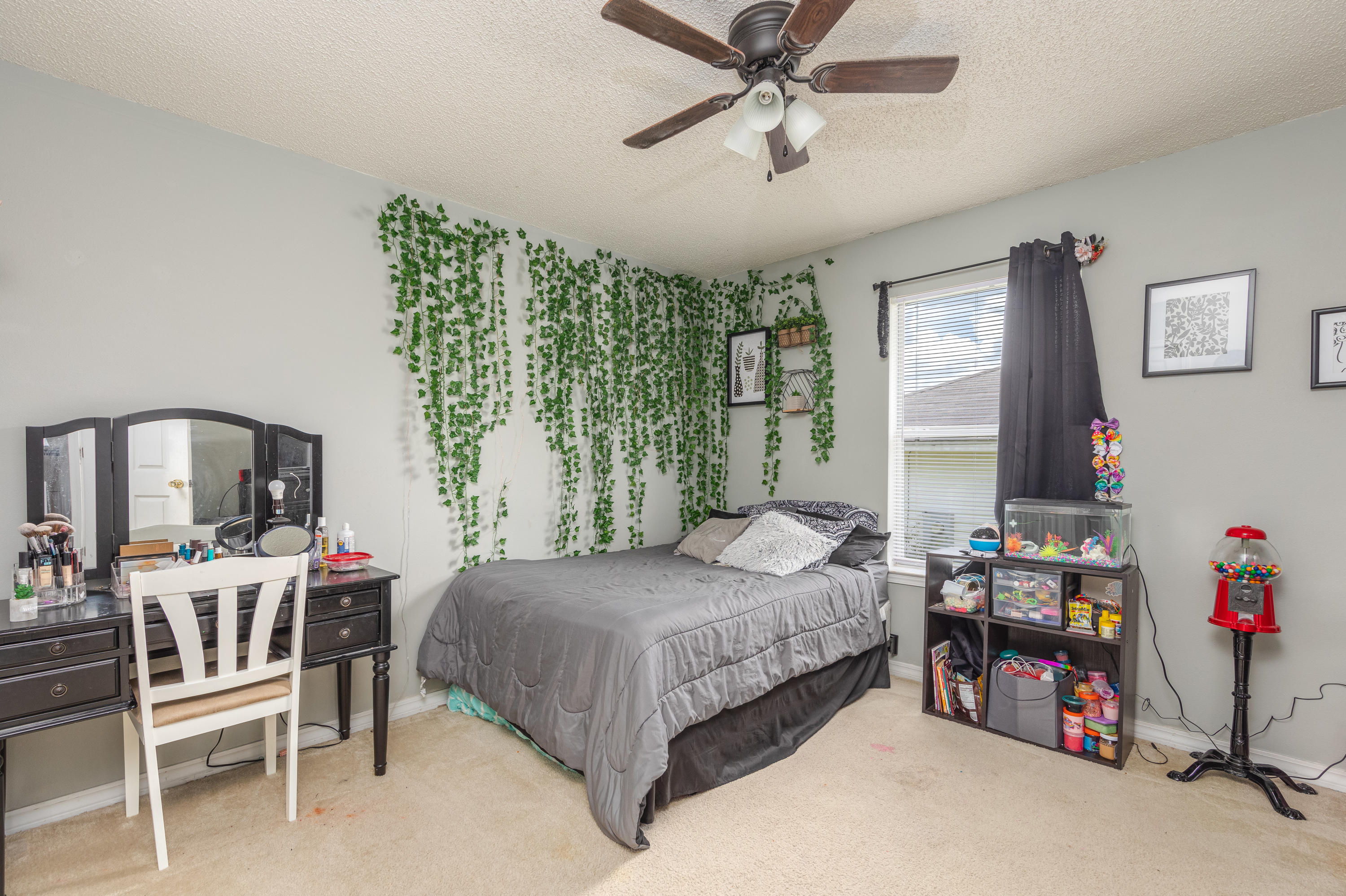 130 Sandstone Trail Crestview, FL 32539 - Photo 12 of 24 a bedroom with a bed furniture and a window