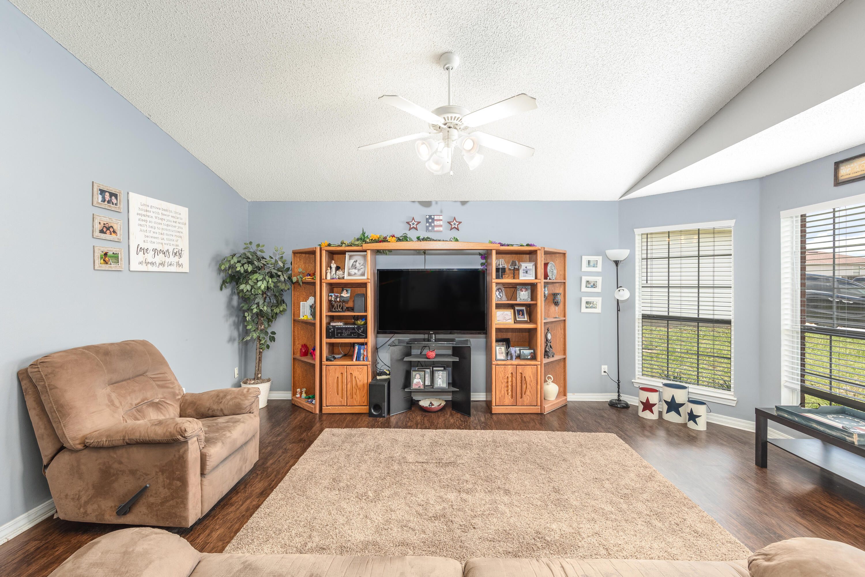 130 Sandstone Trail Crestview, FL 32539 - Photo 3 of 24 a living room with furniture and a flat screen tv