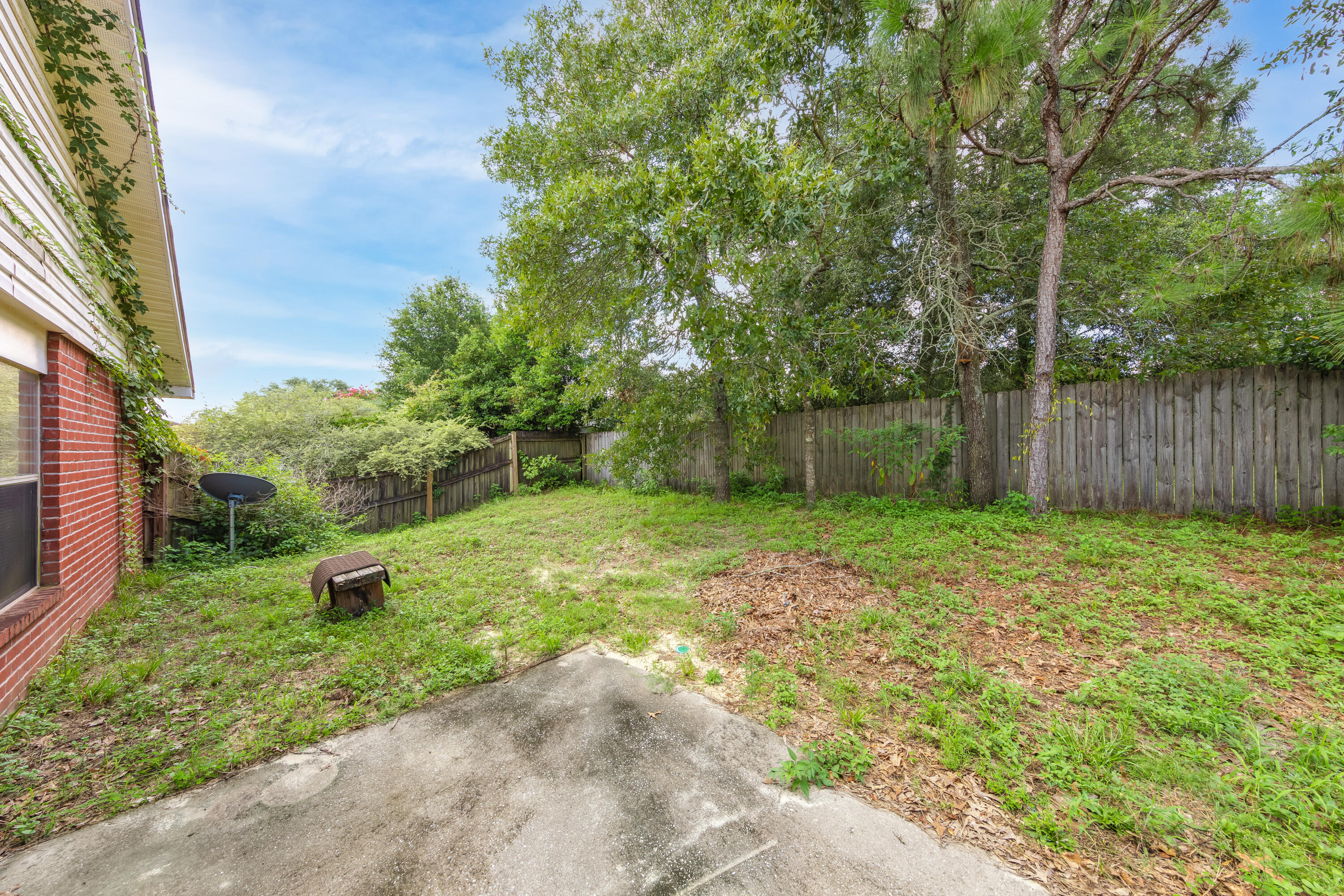 130 Sandstone Trail Crestview, FL 32539 - Photo 24 of 24 a view of a garden with a slide