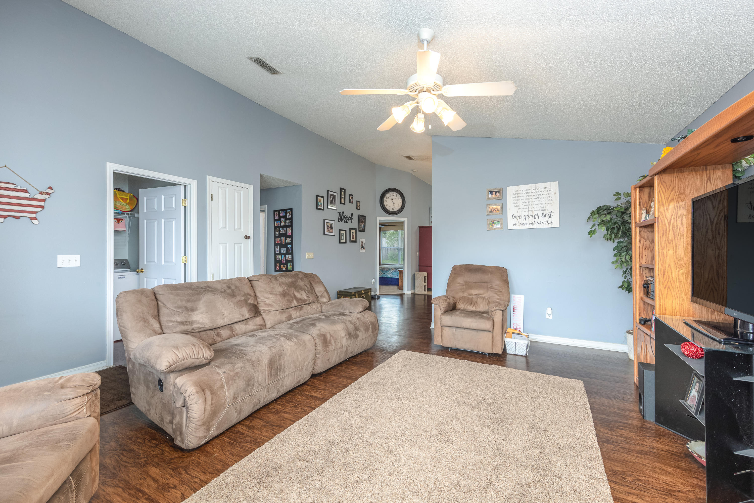 130 Sandstone Trail Crestview, FL 32539 - Photo 6 of 24 a living room with furniture and a flat screen tv