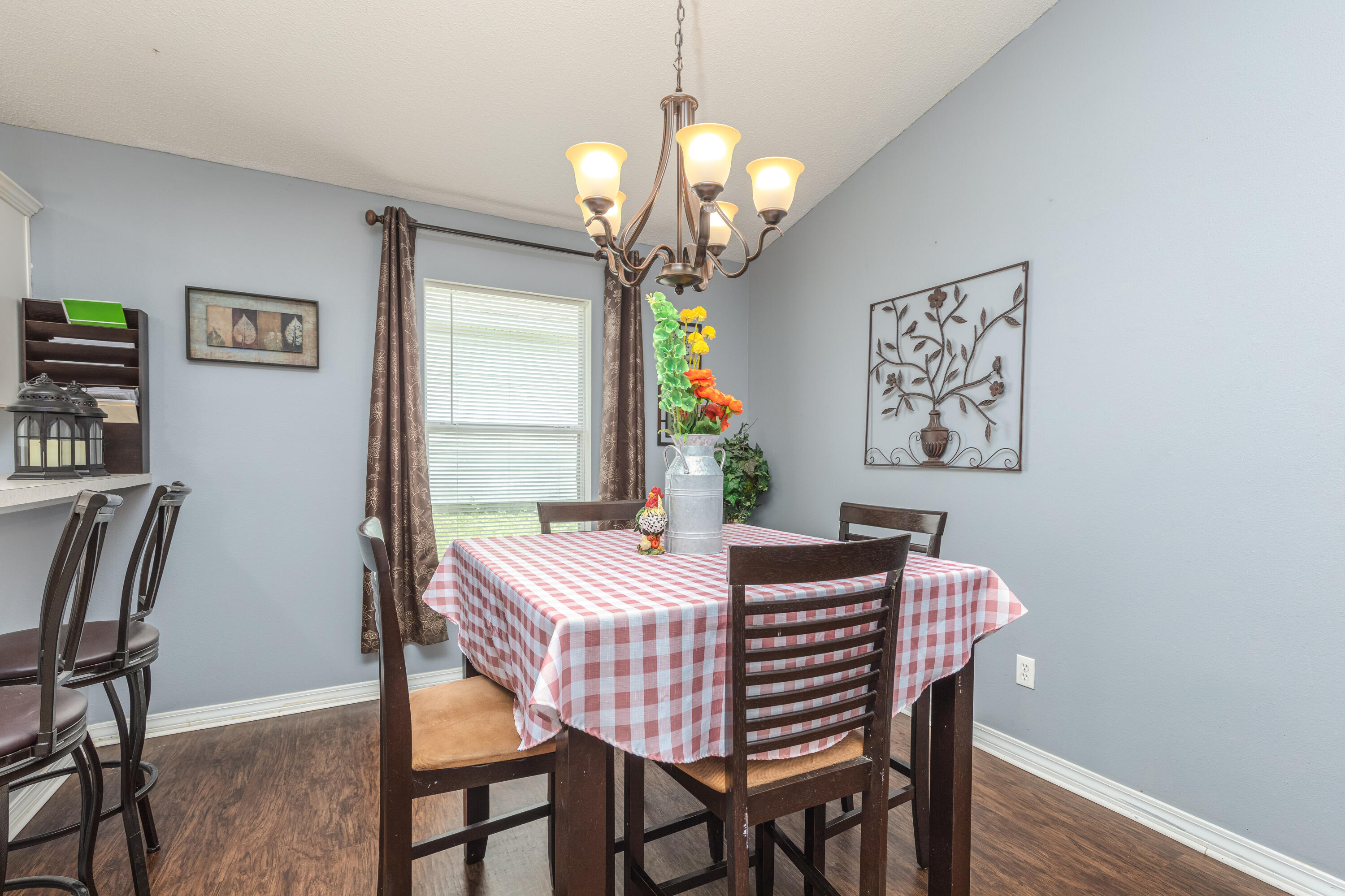 130 Sandstone Trail Crestview, FL 32539 - Photo 10 of 24 a view of a dining room with furniture and chandelier
