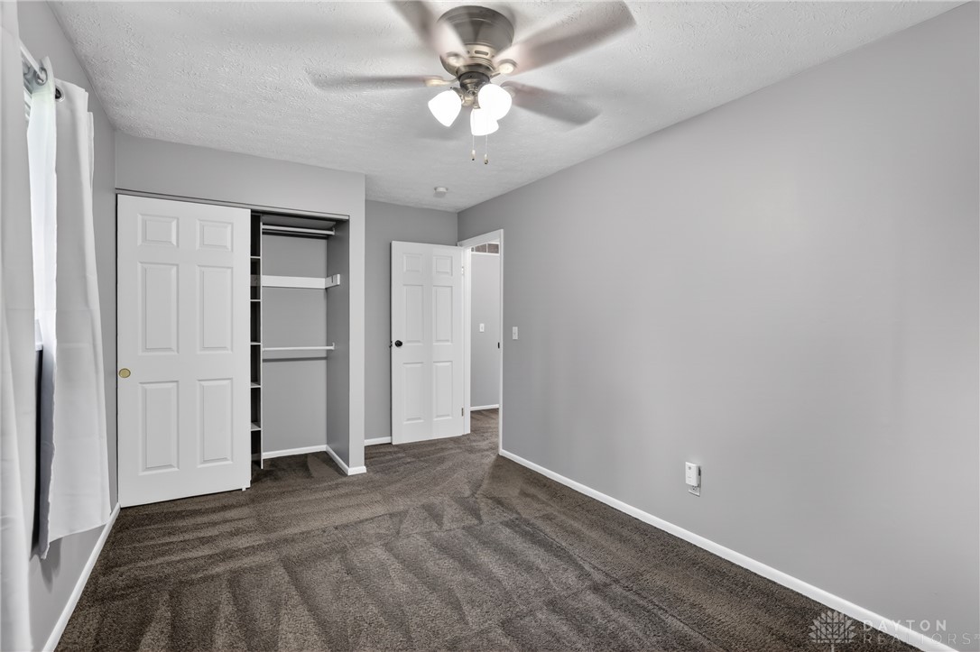 5741 Gray Road Fairfield, OH 45014 - Photo 20 of 32 This spacious bedroom offers ample natural light and a neutral palette, ready for your personal touch.