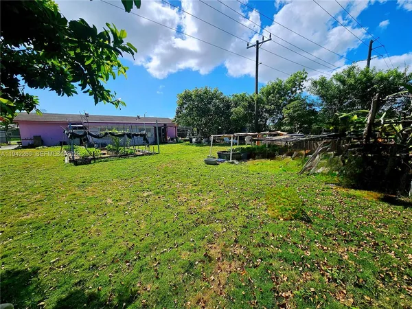 a view of a backyard with a garden