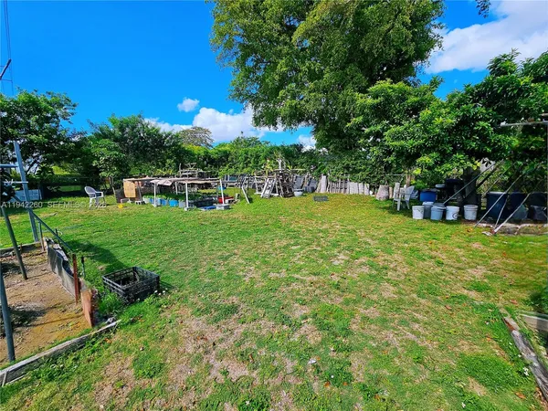 a view of a backyard with a garden