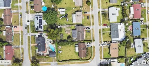 an aerial view of multi story residential apartment building