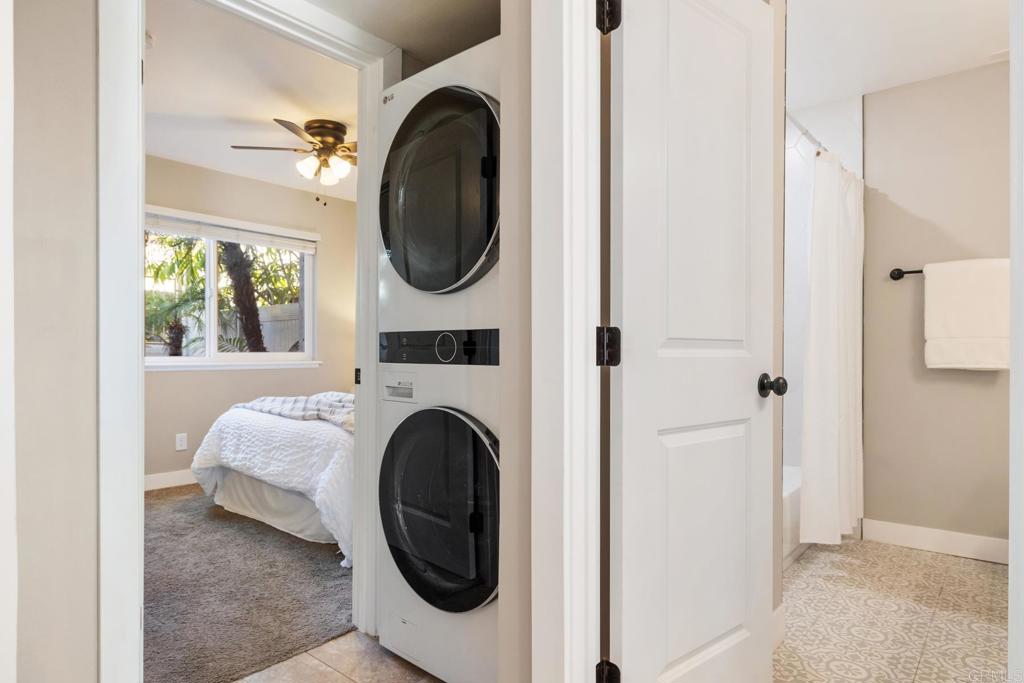 132 South Jayton Lane Encinitas, CA 92024 - Photo 17 of 37 a view of a bedroom with washer and dryer