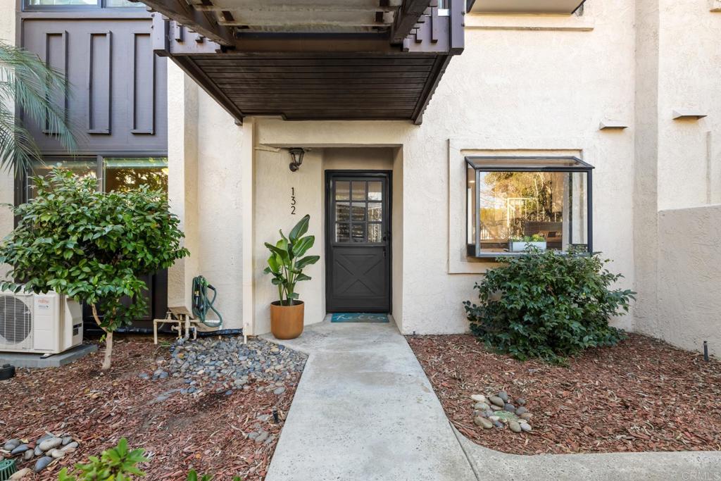 132 South Jayton Lane Encinitas, CA 92024 - Photo 2 of 37 a view of a entryway door of the house