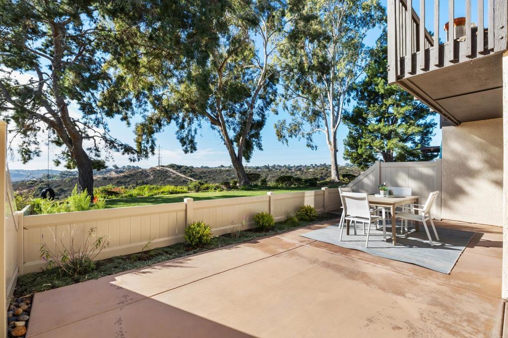 132 South Jayton Lane Encinitas, CA 92024 - Photo 24 of 37 a view of a lake with table and chairs