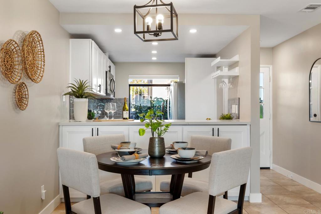 132 South Jayton Lane Encinitas, CA 92024 - Photo 9 of 37 a dining room with furniture and window