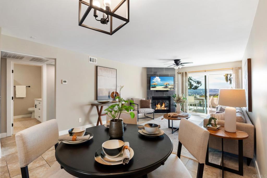 132 South Jayton Lane Encinitas, CA 92024 - Photo 10 of 37 a living room with furniture and a fireplace