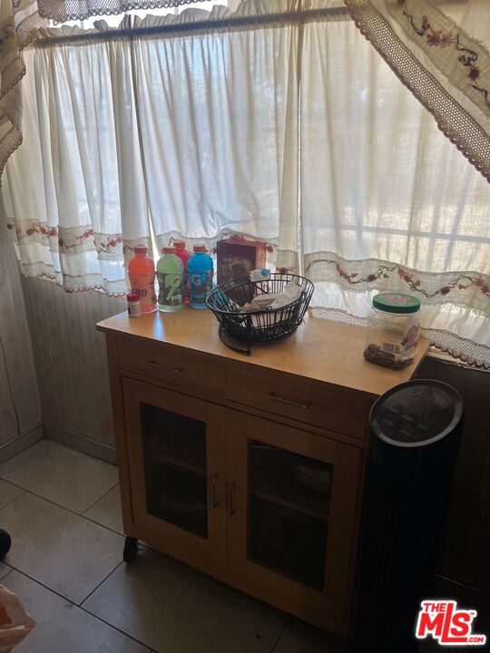 1605 Madison Street Bakersfield, CA 93307 - Photo 8 of 8 a kitchen with a sink and a stove top oven