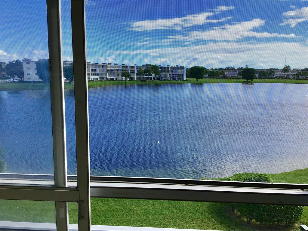3032 Exeter, Unit 3032 Boca Raton, FL 33434 - Photo 25 of 32 a view of a lake