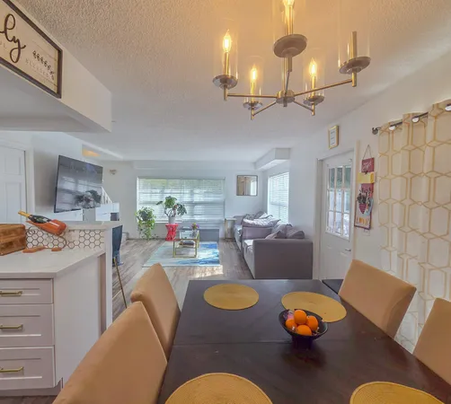 a living room with lots of furniture