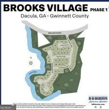 a picture of a book and a white bed