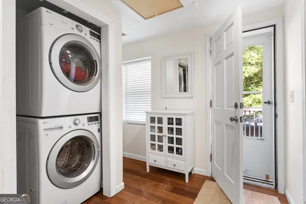 a utility room with dryer and washer