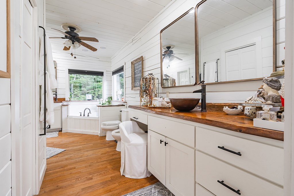328 Black Ankle Creek Road Cherry Log, GA 30522 - Photo 21 of 103 a open kitchen with white cabinets and wooden floor