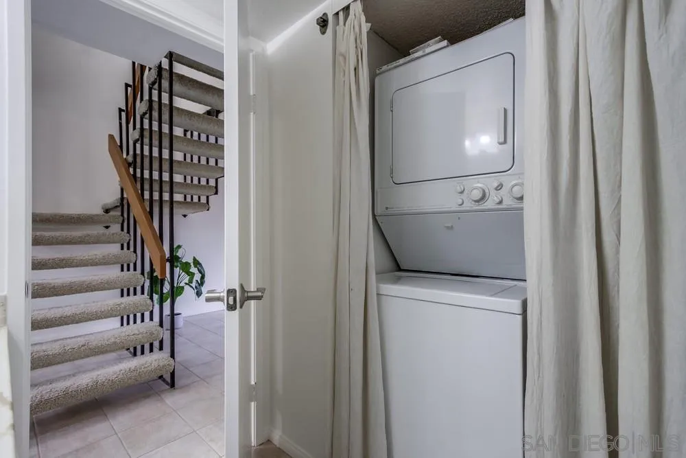 8918 Fletcher Valley Dr. Santee, CA 92071 - Photo 16 of 31 a utility room with dryer and washer