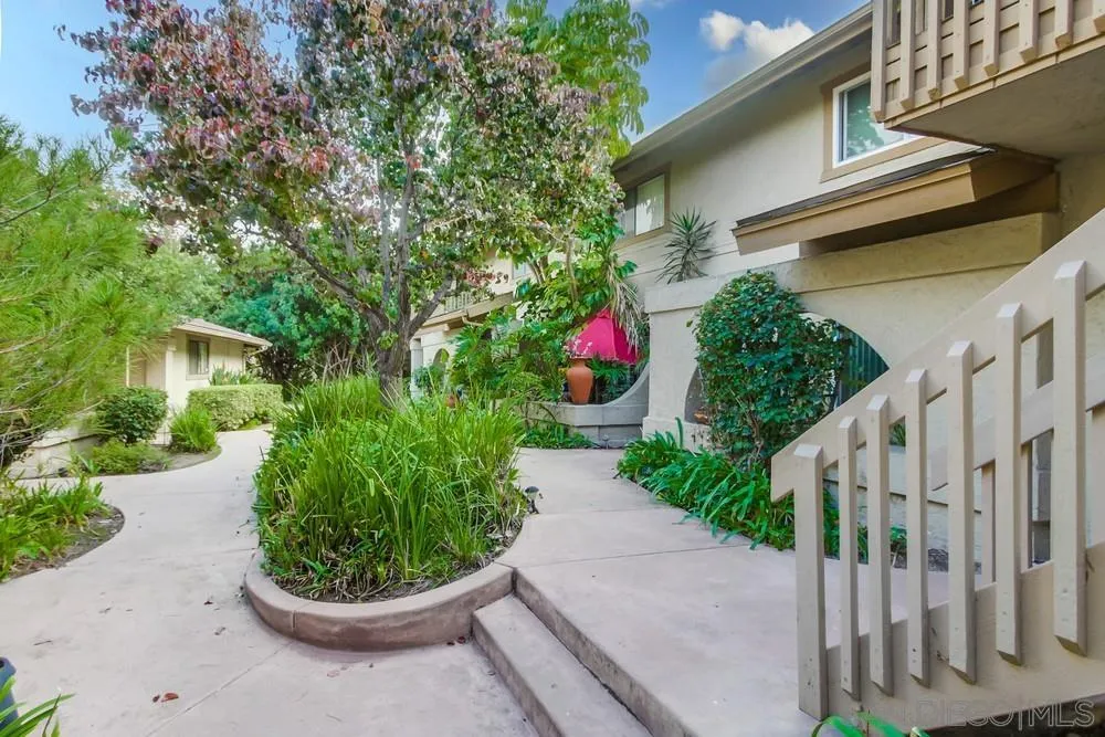 8918 Fletcher Valley Dr. Santee, CA 92071 - Photo 2 of 31 a view of a garden with pathway