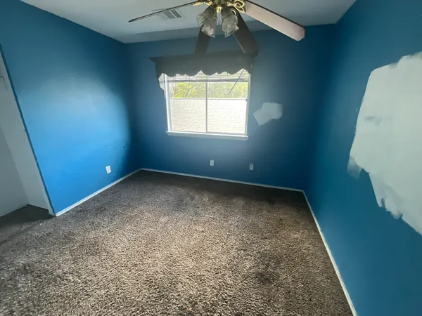 an empty room with a window