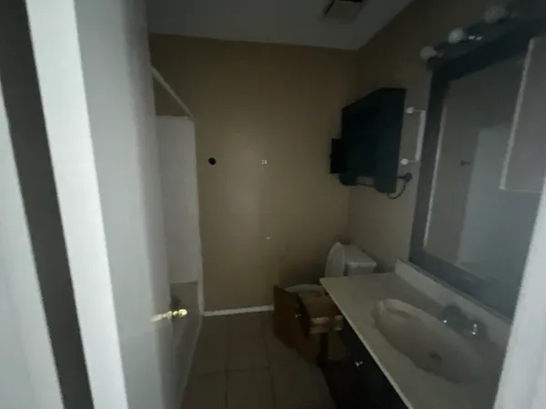 a bathroom with a toilet and a sink