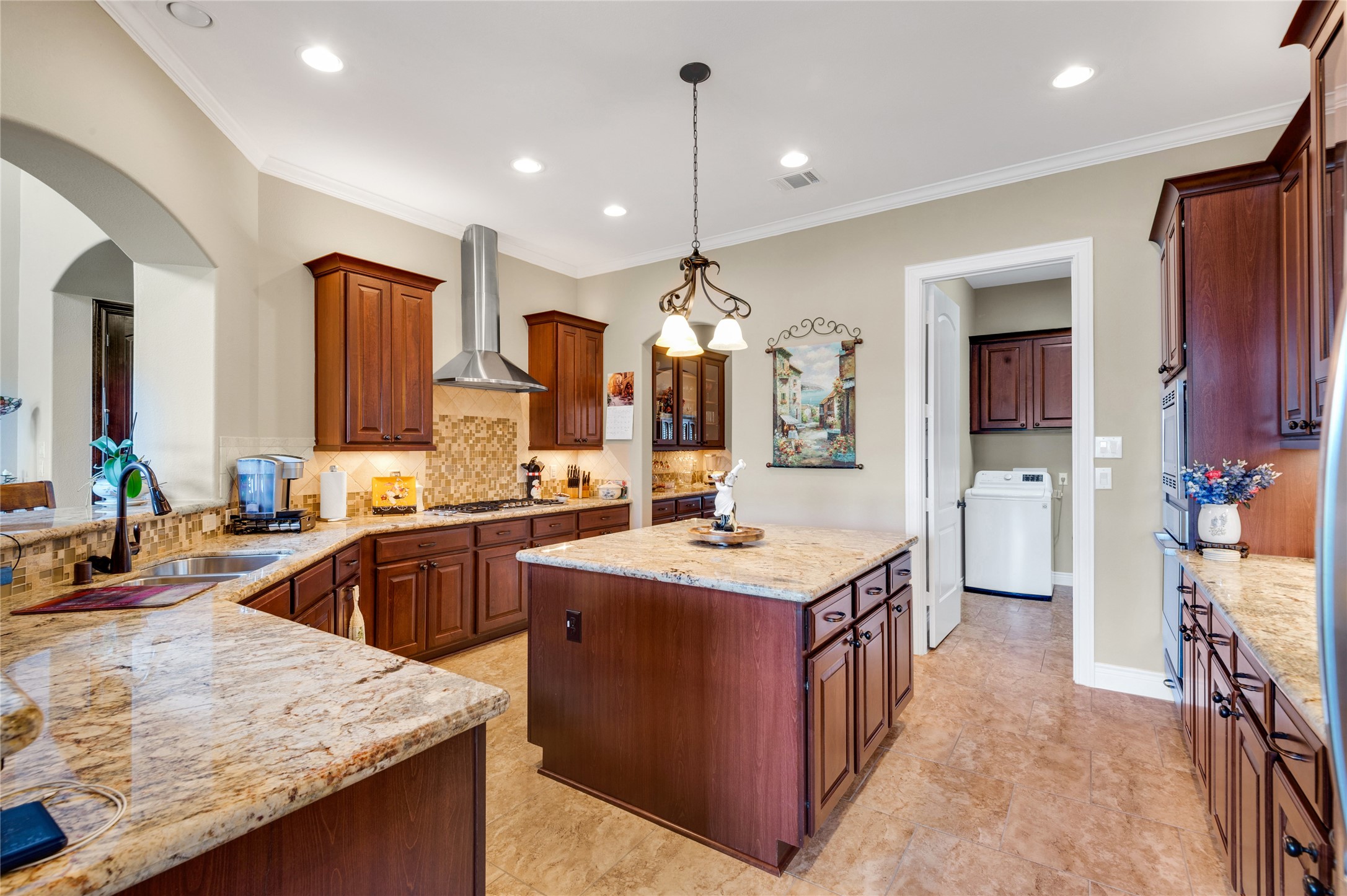 6119 Lofty Lane Spring, TX 77379 - Photo 26 of 40 Spacious kitchen provides plenty of room for entertaining family and guest. A nearby laundry area adds convenience.