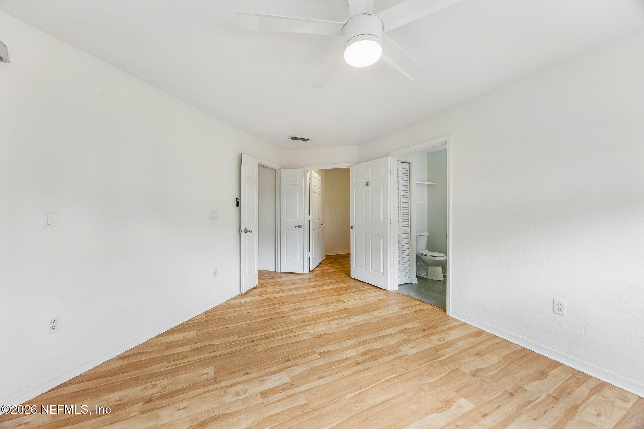 10150 Belle Rive Boulevard, Unit 1109 Jacksonville, FL 32256 - Photo 15 of 55 a view of empty room with wooden floor