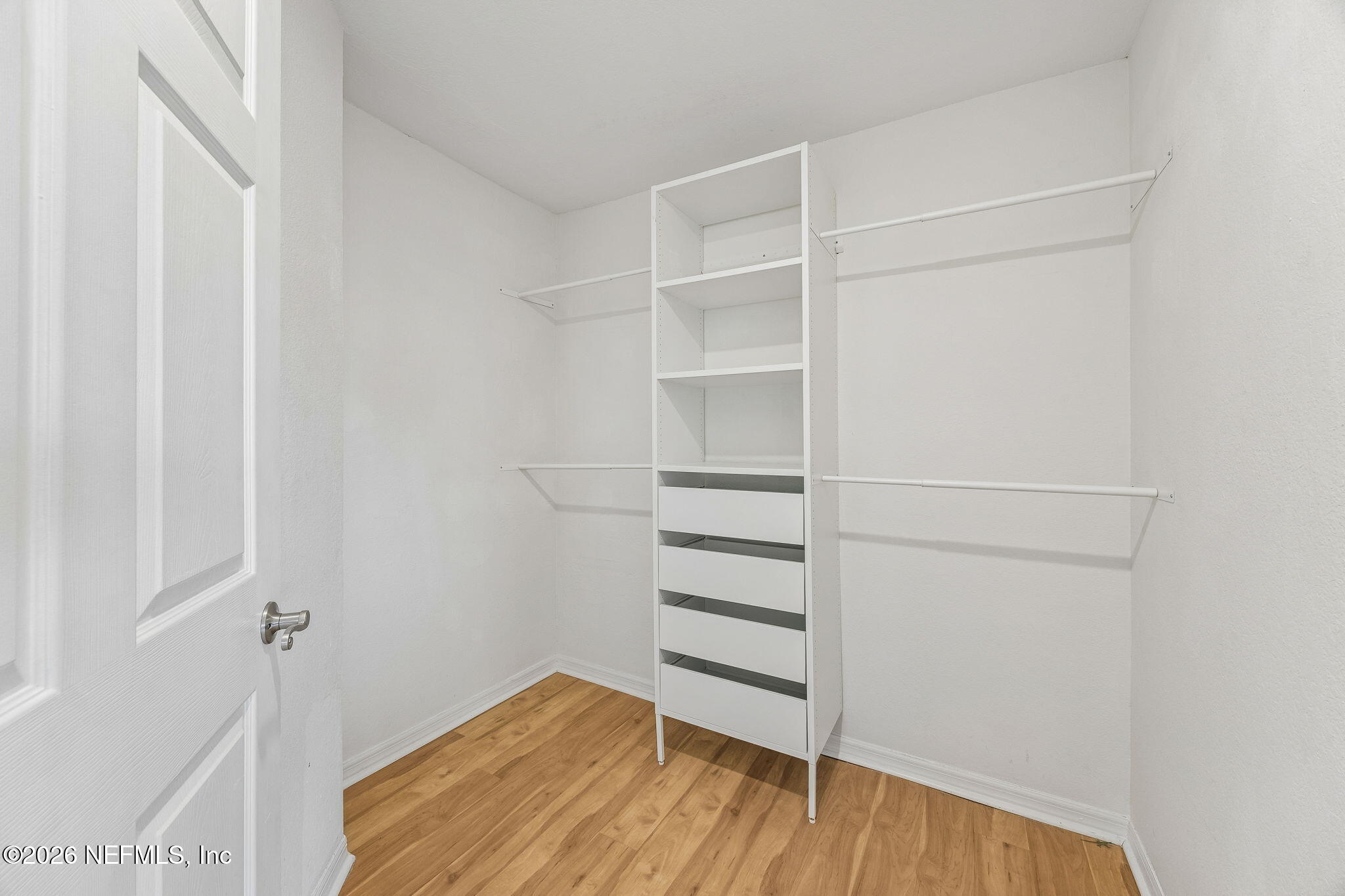 10150 Belle Rive Boulevard, Unit 1109 Jacksonville, FL 32256 - Photo 18 of 55 a view of a room with shelf