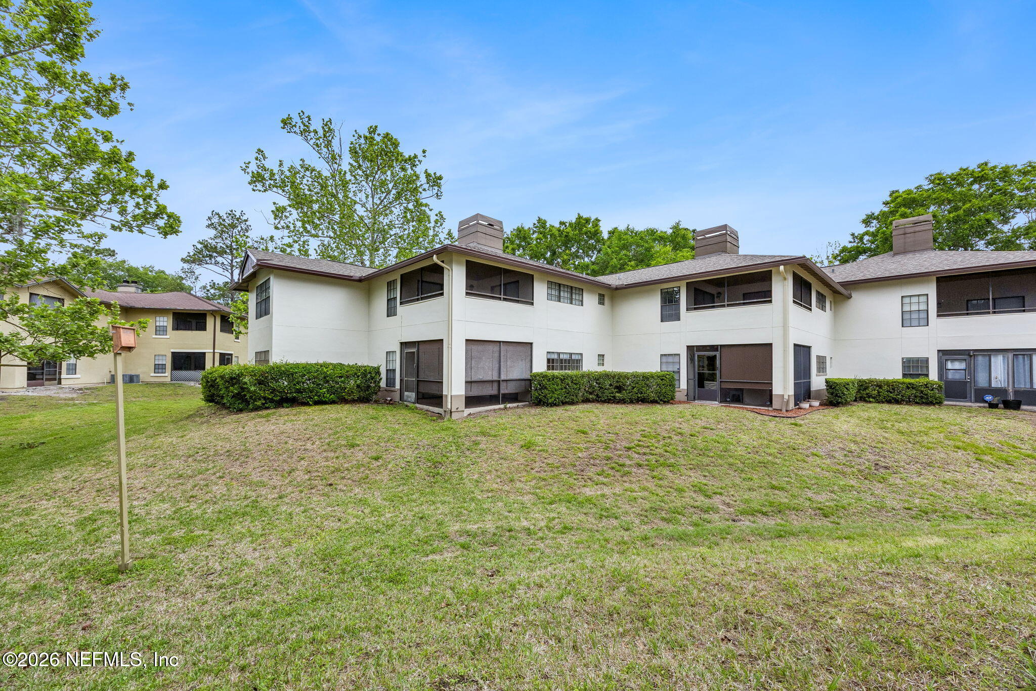 10150 Belle Rive Boulevard, Unit 1109 Jacksonville, FL 32256 - Photo 30 of 55 a house view with a garden space
