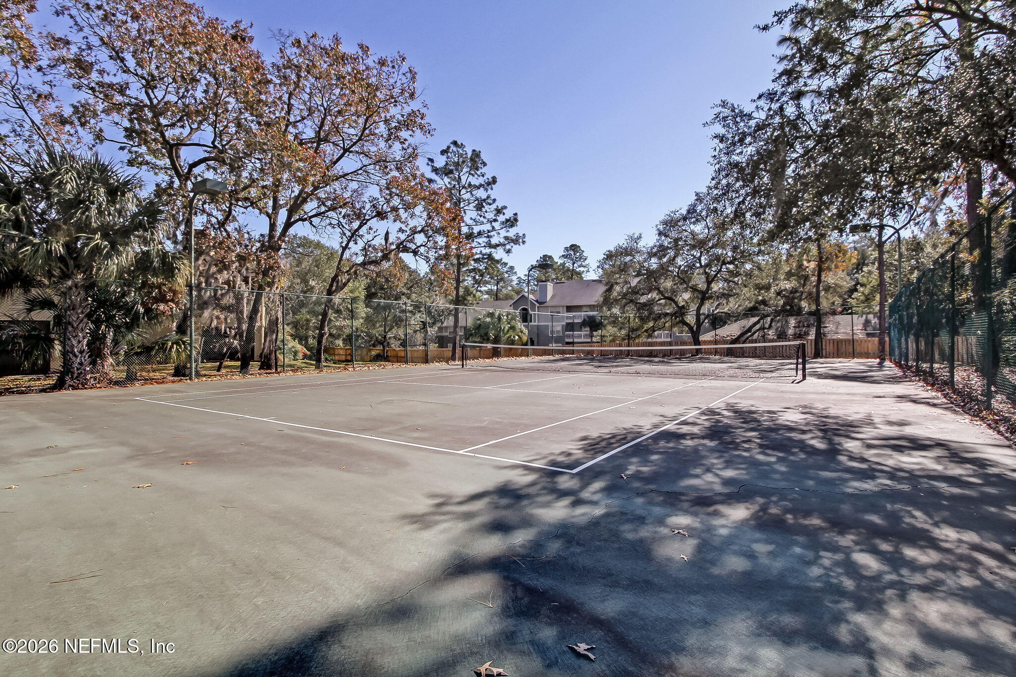 10150 Belle Rive Boulevard, Unit 1109 Jacksonville, FL 32256 - Photo 36 of 55 a view of outdoor space with trees