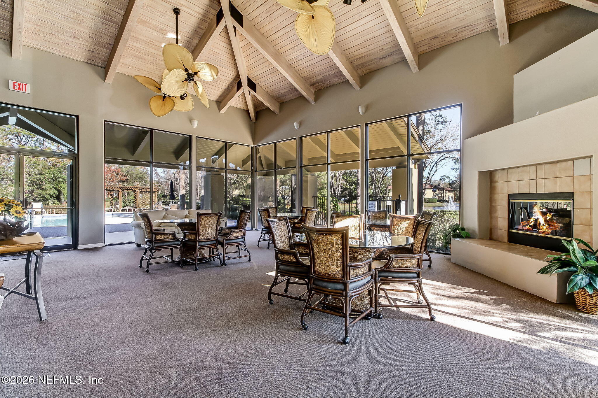 10150 Belle Rive Boulevard, Unit 1109 Jacksonville, FL 32256 - Photo 38 of 55 a view of a dining room with furniture window and outside view