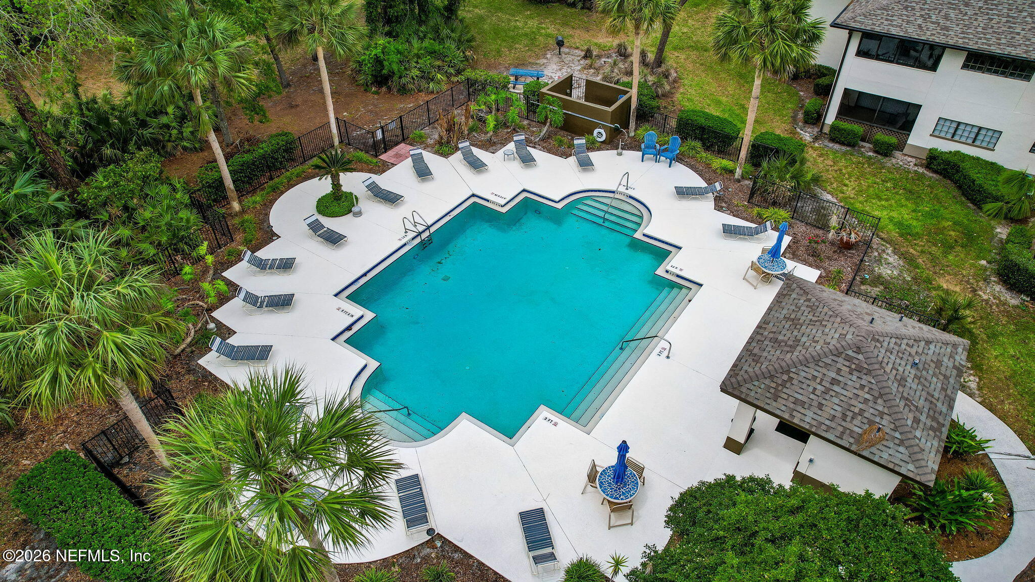 10150 Belle Rive Boulevard, Unit 1109 Jacksonville, FL 32256 - Photo 53 of 55 an aerial view of a house with outdoor space patio and trees