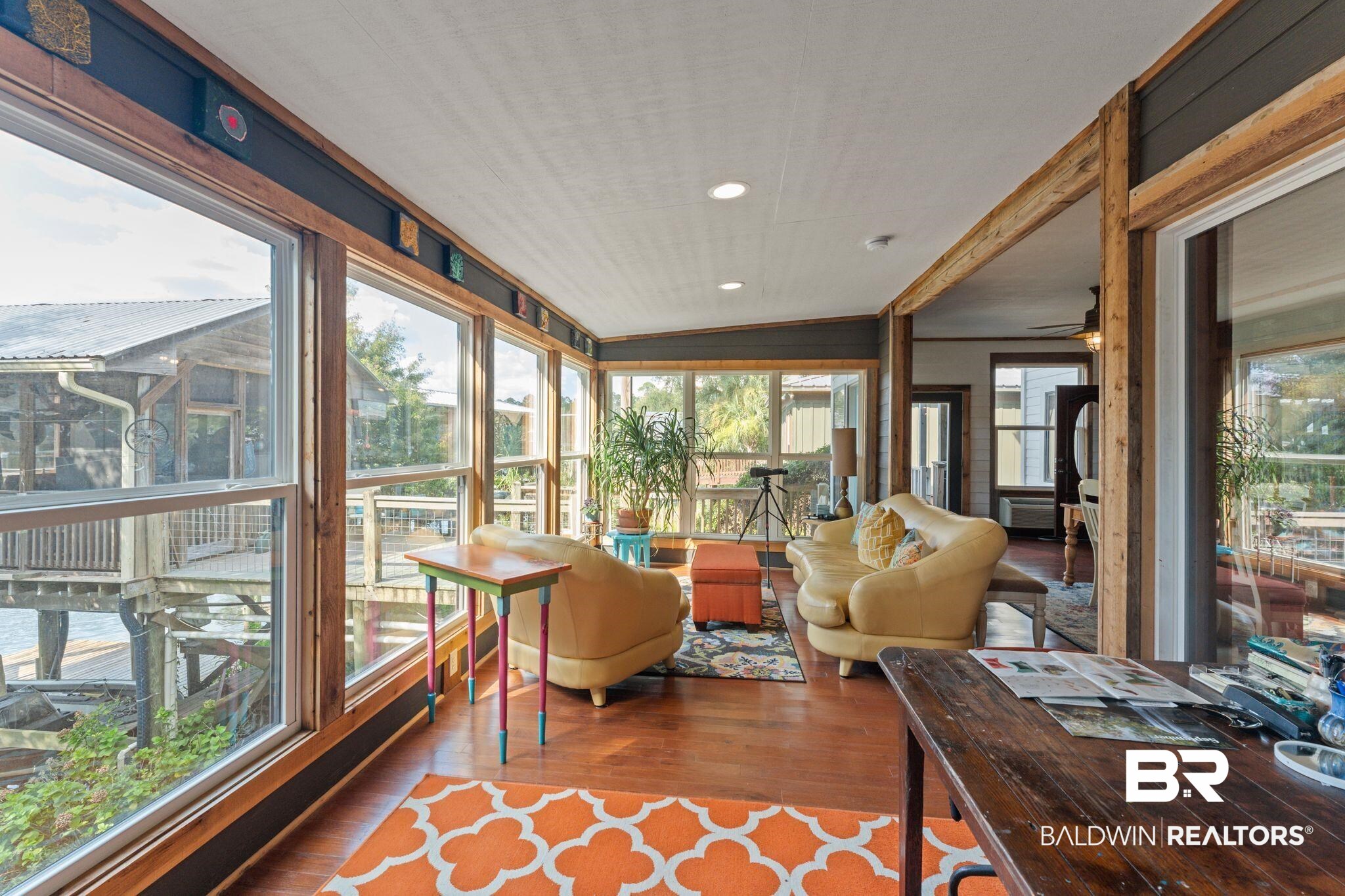 16451 Honey Road Summerdale, AL 36580 - Photo 12 of 55 Sunroom featuring lofted ceiling, wood finished floors, and recessed lighting