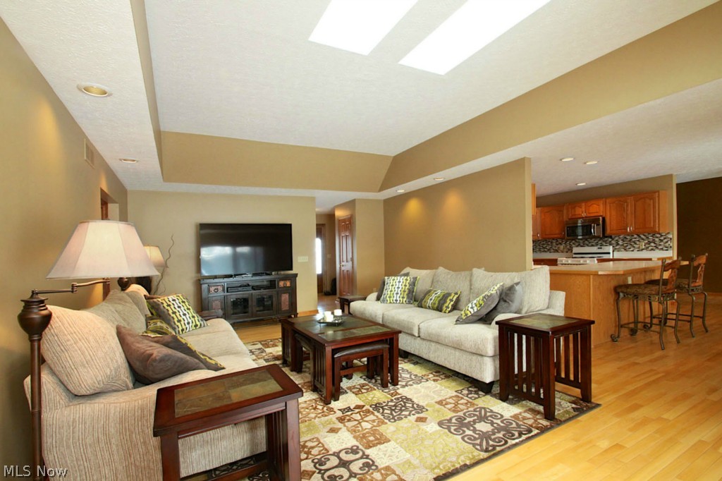 38557 Otten Road North Ridgeville, OH 44039 - Photo 3 of 25 Great room w/trey ceiling and skylights opens to updated eat-in kitchen.