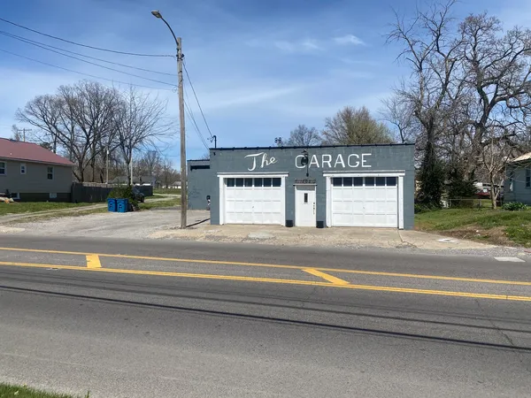 a view of a building with a street