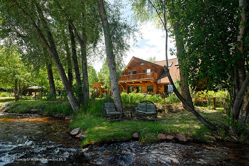 642 Frying Pan Road Basalt, CO 81621 - Photo 11 of 20 a backyard of a house with lots of green space