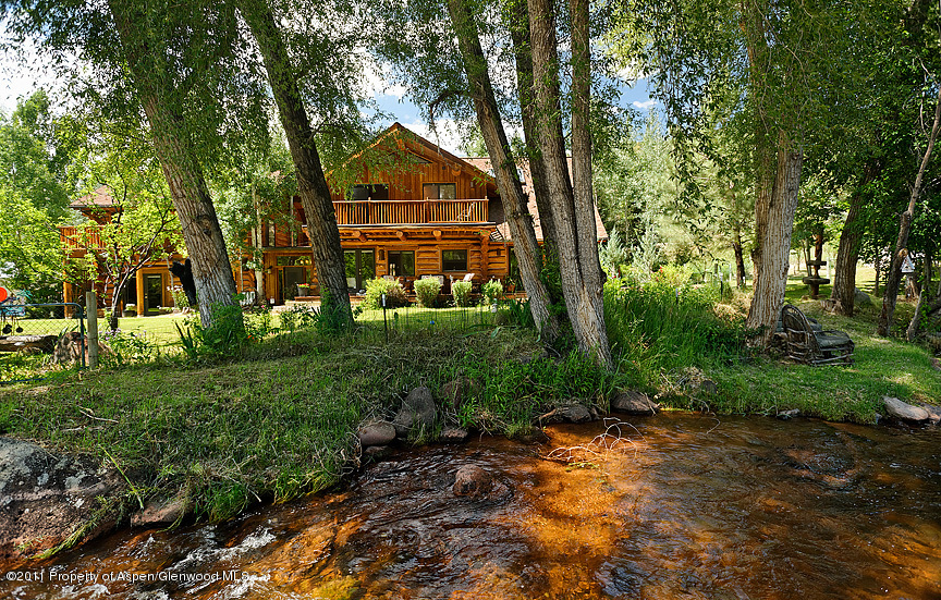 642 Frying Pan Road Basalt, CO 81621 - Photo 12 of 20 a front view of a house with garden
