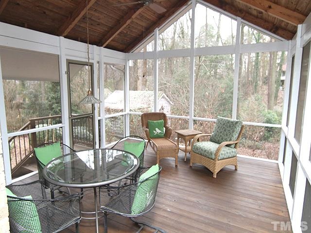 1605 Westhaven Drive Raleigh, NC 27607 - Photo 13 of 23 a view of a dining room with furniture wooden floor and a potted plant