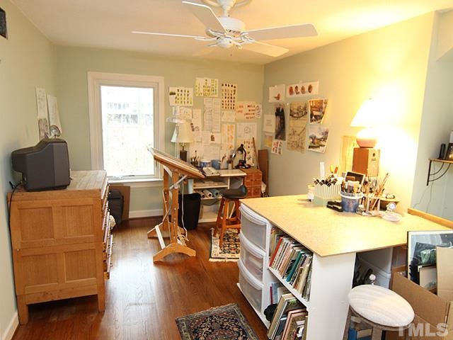 1605 Westhaven Drive Raleigh, NC 27607 - Photo 15 of 23 a view of a dining room with furniture and wooden floor