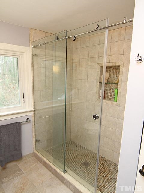 1605 Westhaven Drive Raleigh, NC 27607 - Photo 17 of 23 a bathroom with a shower